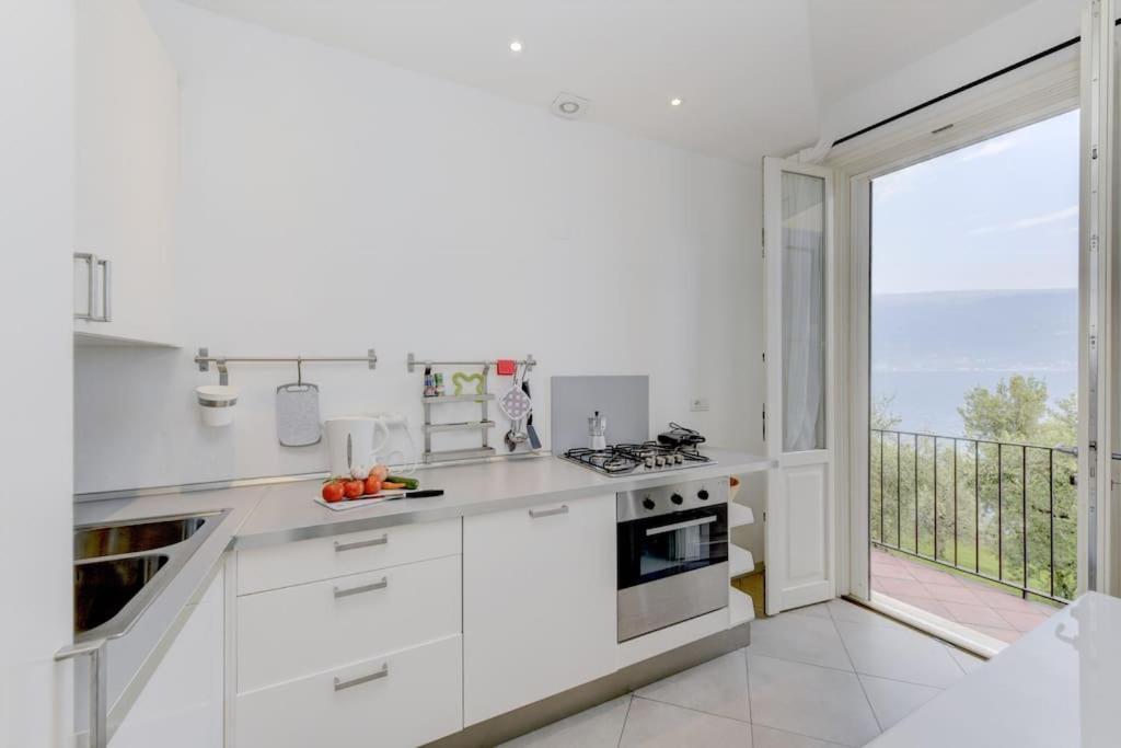 Oleandro Apartment Directly On The Lake Gargnano Bagian luar foto